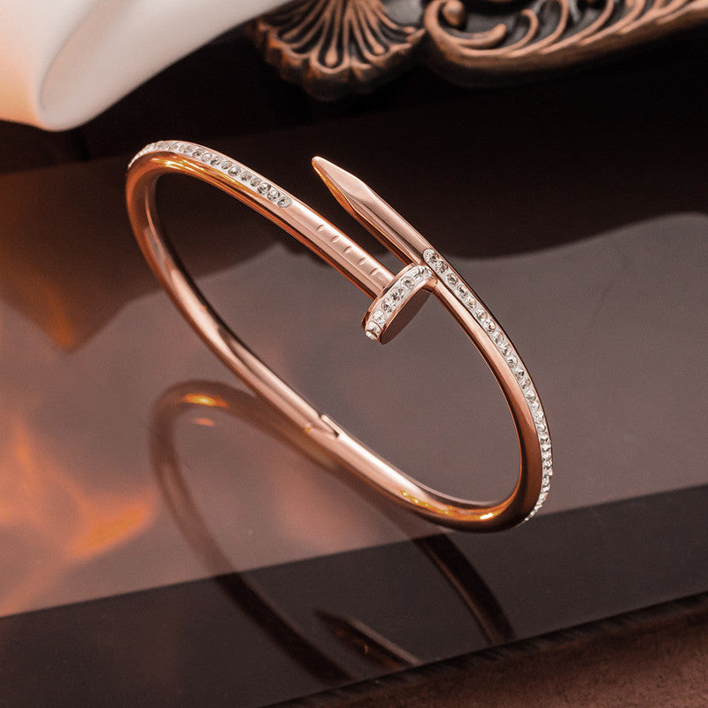 Gold, Rose Gold and Silver Plated Stainless Steel Anti Tarnish AD Studded Nail Bracelet