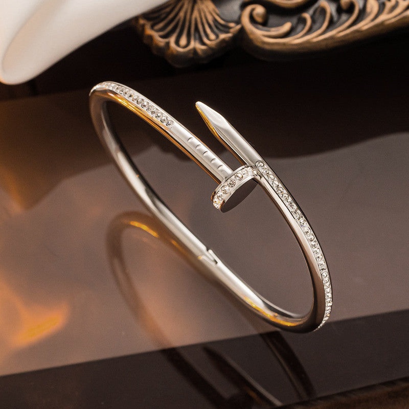Gold, Rose Gold and Silver Plated Stainless Steel Anti Tarnish AD Studded Nail Bracelet