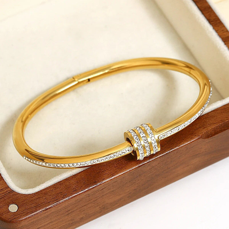 Stainless Steel Gold, Rose Gold and Silver Plated American Diamond Studded Bangle Style Bracelet