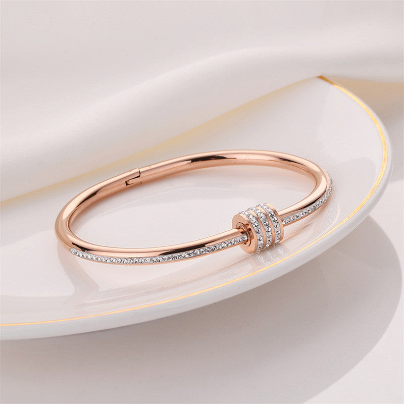 Stainless Steel Gold, Rose Gold and Silver Plated American Diamond Studded Bangle Style Bracelet