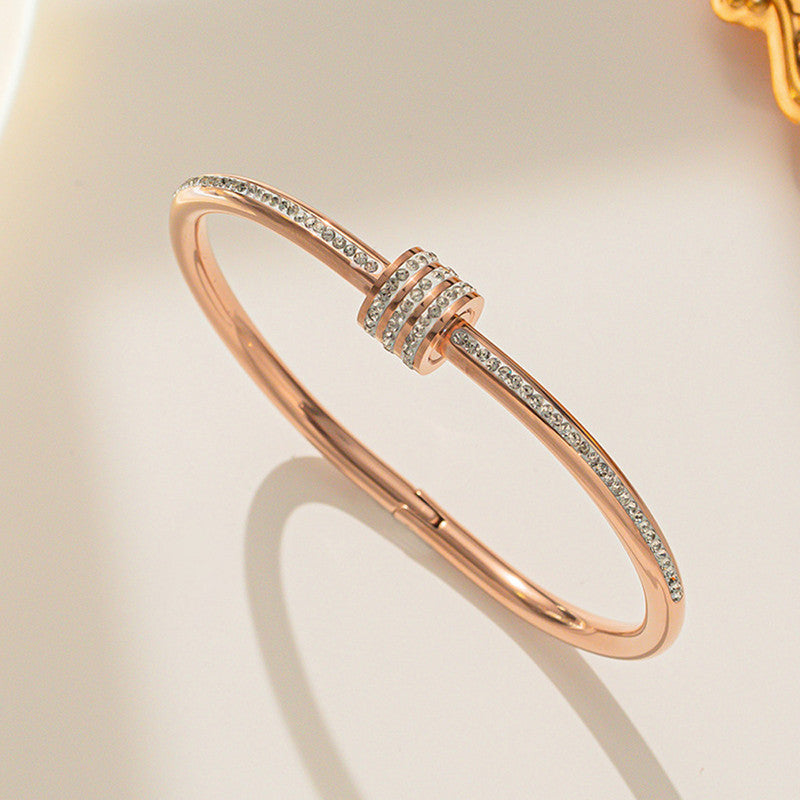 Stainless Steel Gold, Rose Gold and Silver Plated American Diamond Studded Bangle Style Bracelet