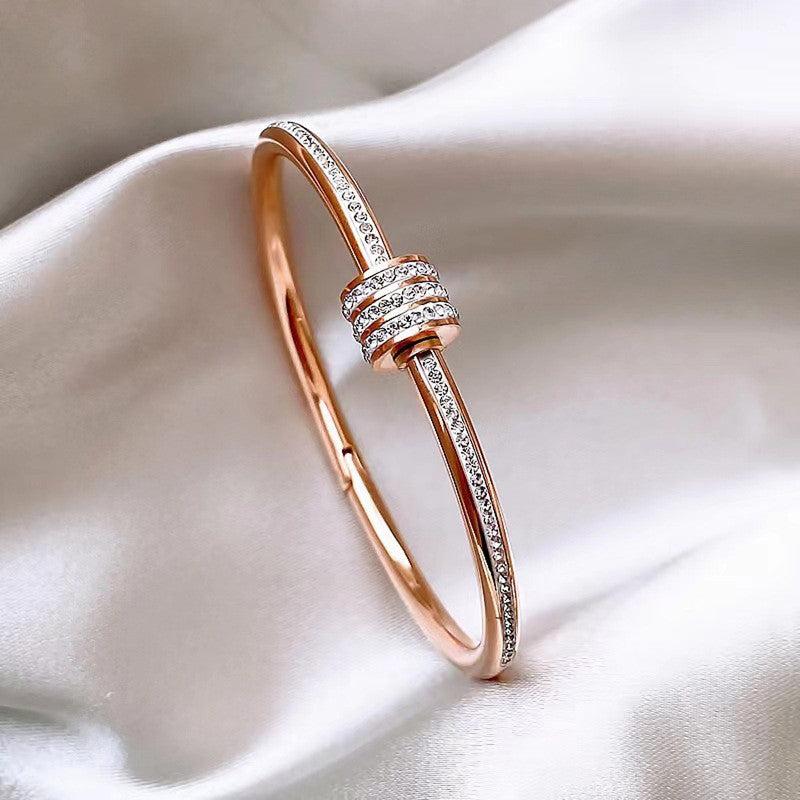 Stainless Steel Gold, Rose Gold and Silver Plated American Diamond Studded Bangle Style Bracelet
