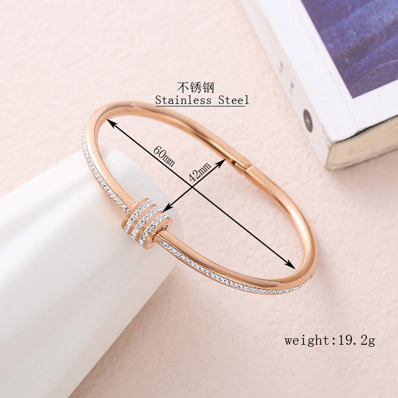 Stainless Steel Gold, Rose Gold and Silver Plated American Diamond Studded Bangle Style Bracelet