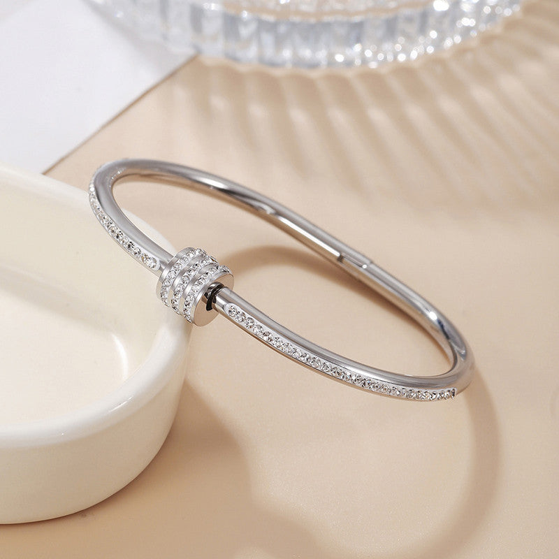 Stainless Steel Gold, Rose Gold and Silver Plated American Diamond Studded Bangle Style Bracelet