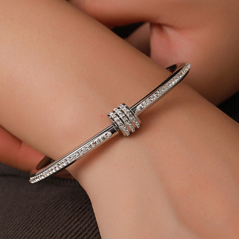Stainless Steel Gold, Rose Gold and Silver Plated American Diamond Studded Bangle Style Bracelet