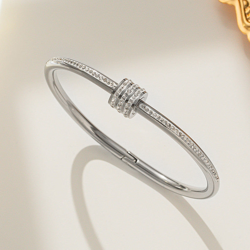 Stainless Steel Gold, Rose Gold and Silver Plated American Diamond Studded Bangle Style Bracelet
