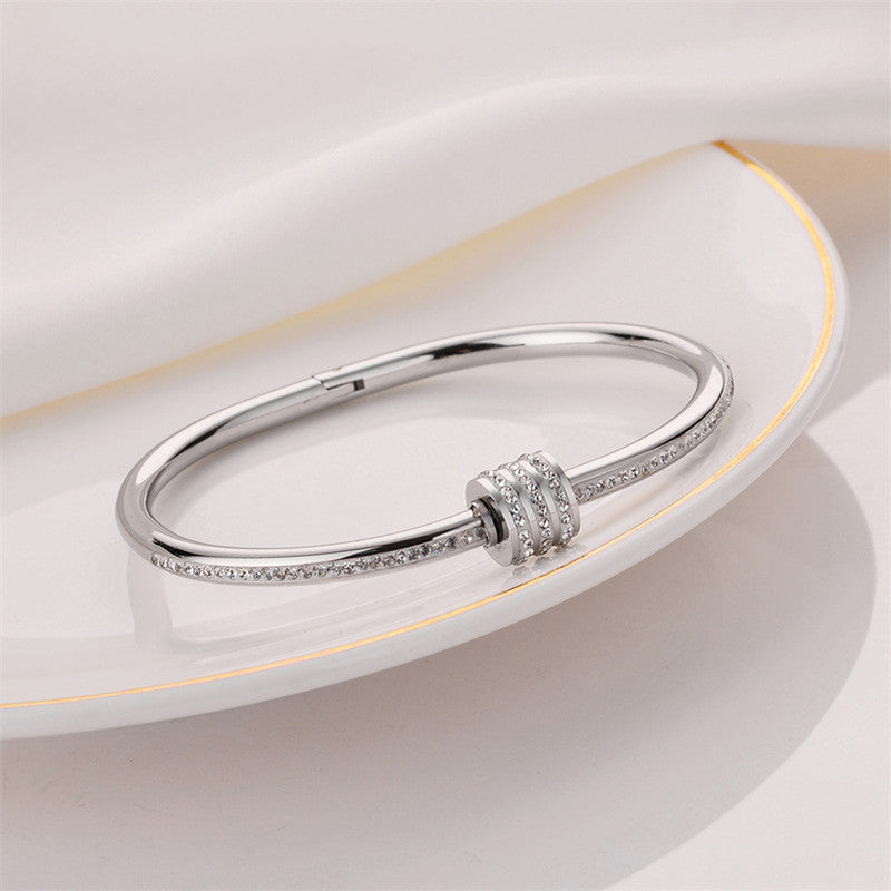 Stainless Steel Gold, Rose Gold and Silver Plated American Diamond Studded Bangle Style Bracelet