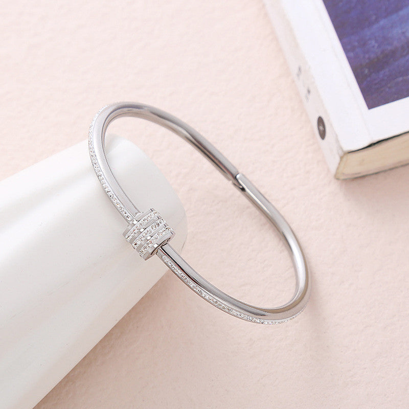 Stainless Steel Gold, Rose Gold and Silver Plated American Diamond Studded Bangle Style Bracelet