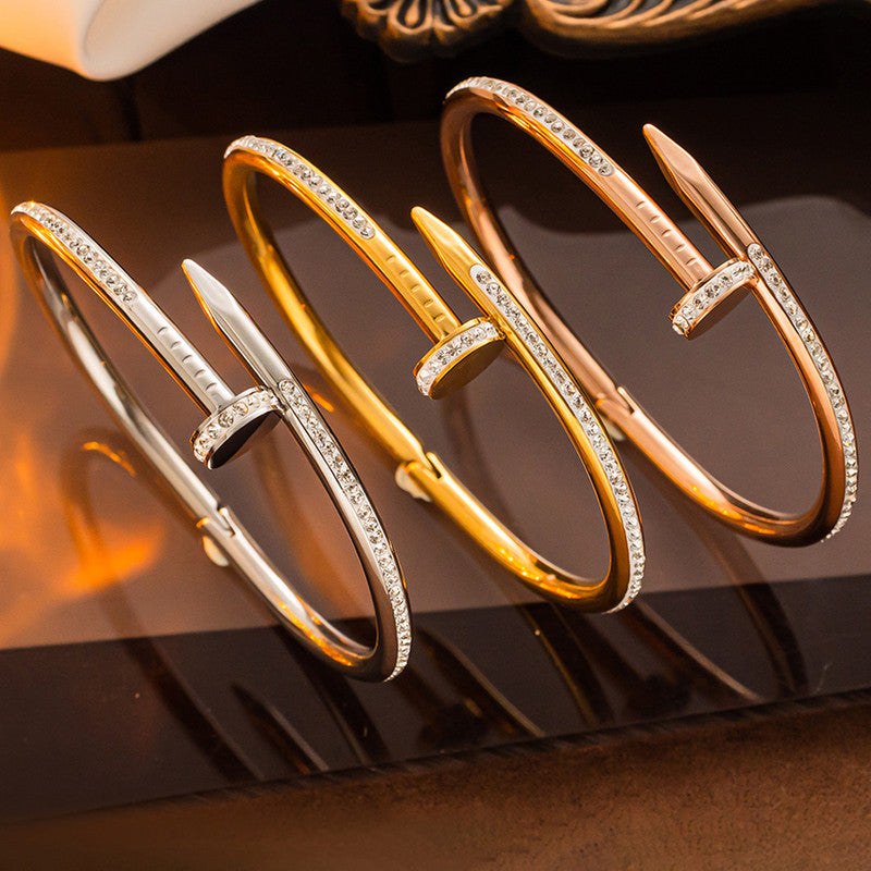 Gold, Rose Gold and Silver Plated Stainless Steel Anti Tarnish AD Studded Nail Bracelet