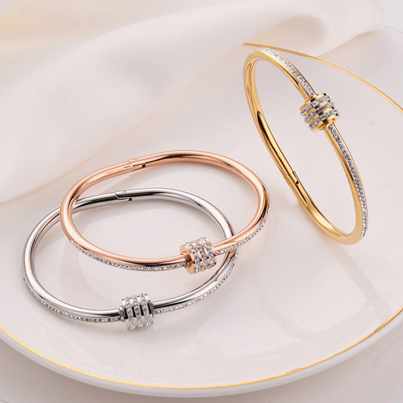 Stainless Steel Gold, Rose Gold and Silver Plated American Diamond Studded Bangle Style Bracelet