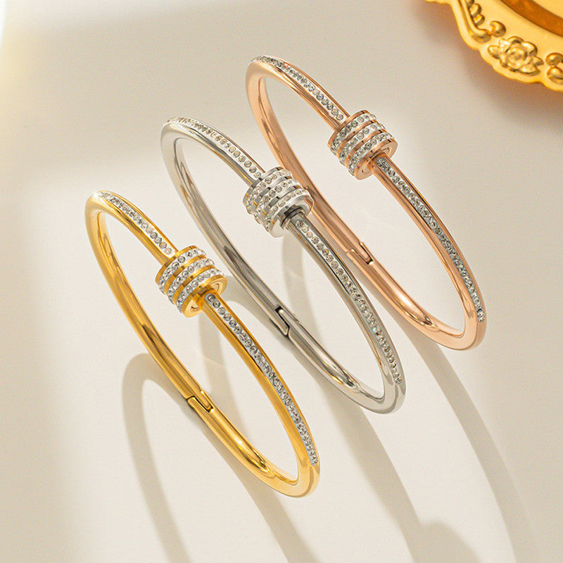 Stainless Steel Gold, Rose Gold and Silver Plated American Diamond Studded Bangle Style Bracelet