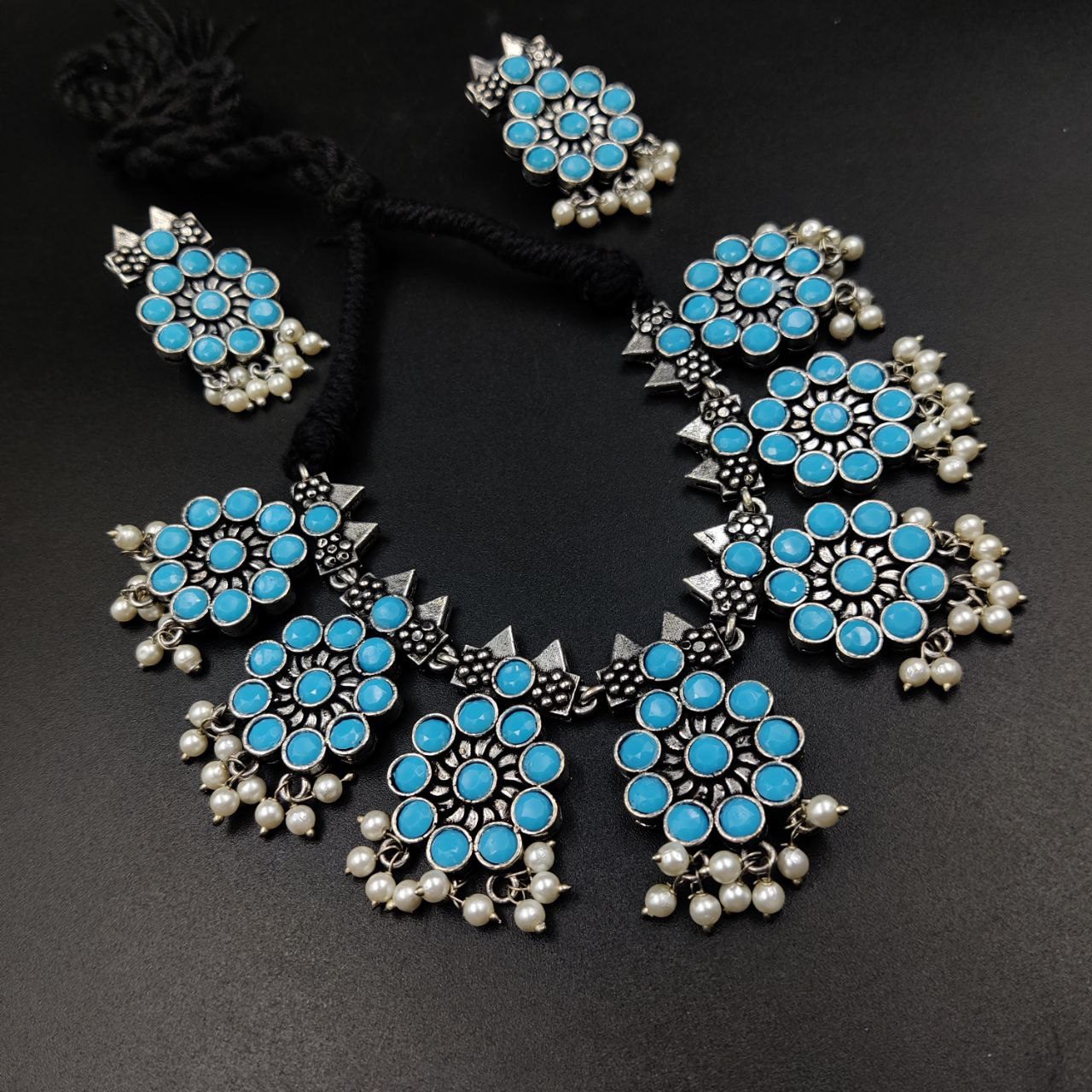 Ethnic-inspired oxidized stone choker set with a touch of elegance