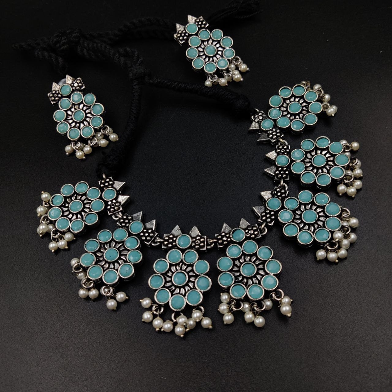 Ethnic-inspired oxidized stone choker set with a touch of elegance