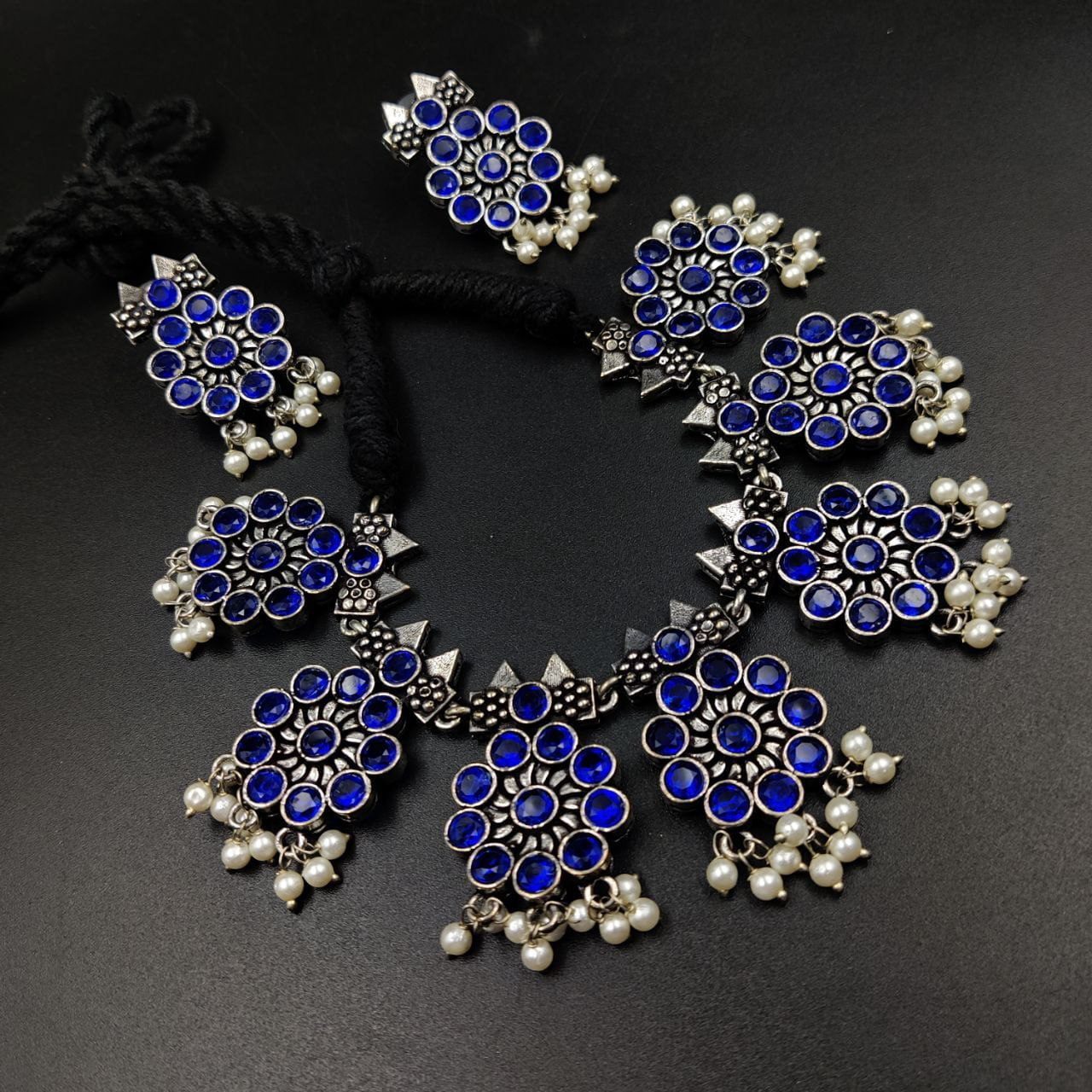 Ethnic-inspired oxidized stone choker set with a touch of elegance