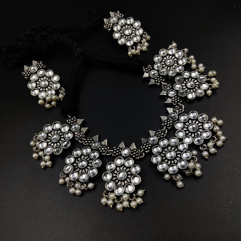 Ethnic-inspired oxidized stone choker set with a touch of elegance