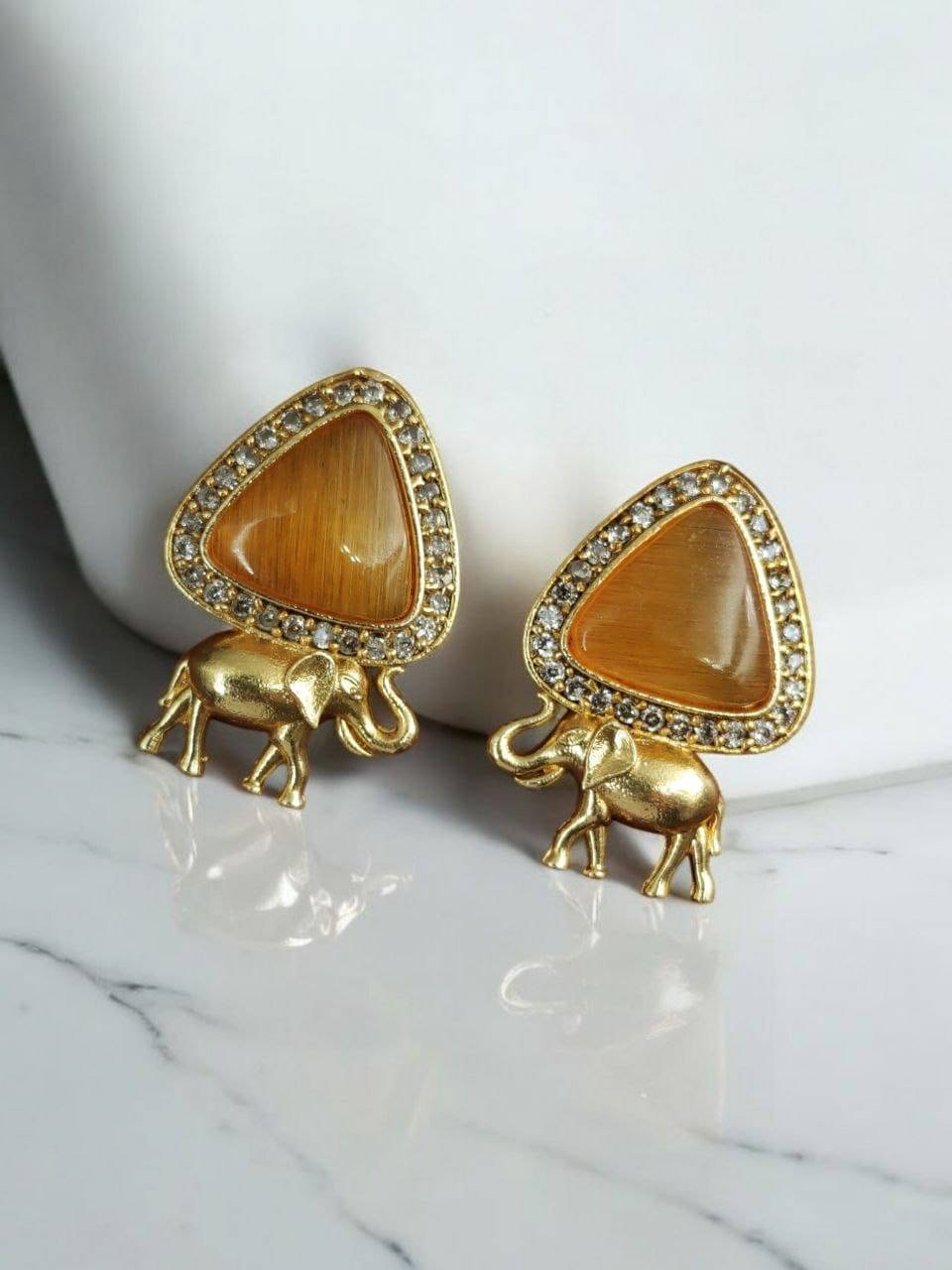 Contemporary AD Earrings | Best Gold-Plated Elephant Design Stud Stone Earrings