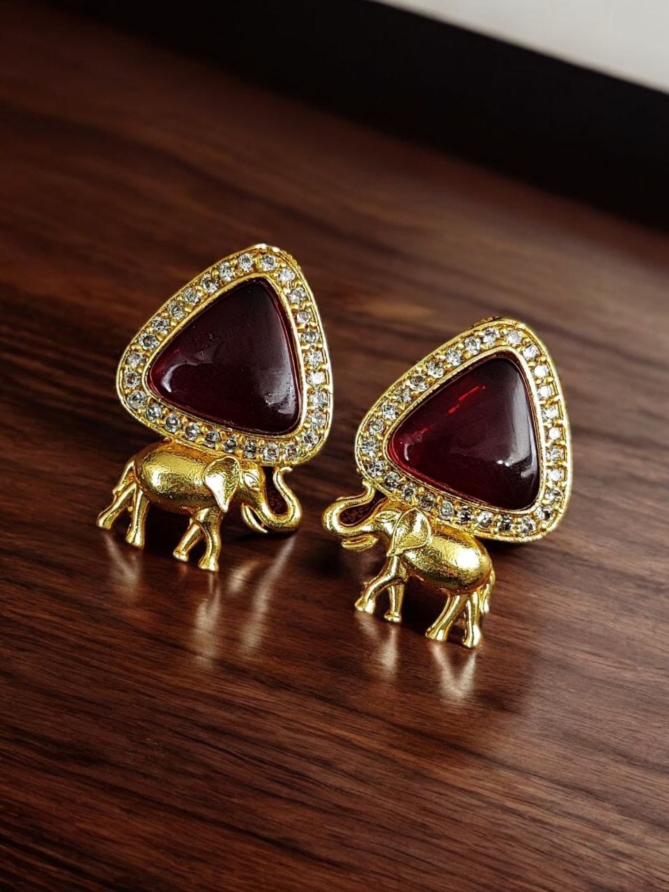 Contemporary AD Earrings | Best Gold-Plated Elephant Design Stud Stone Earrings